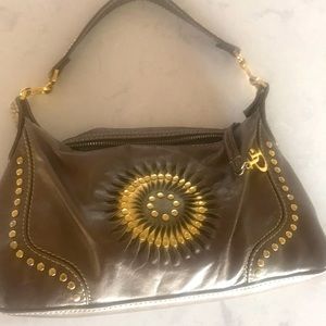 Platinum handbag with gold metal studs